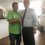 Car Accident Attorney Larry Tylka with client Luis Aguillon-Ramos